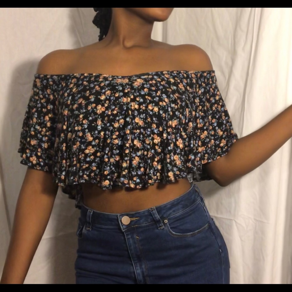 A black floral crop top from Charlotte russe.